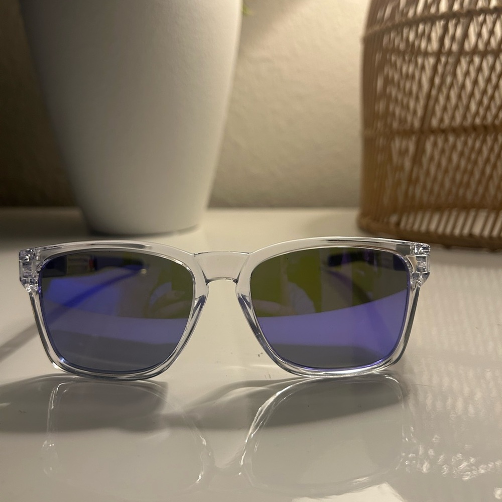 Oakley Clear Frame Sunglasses with Blue Lenses